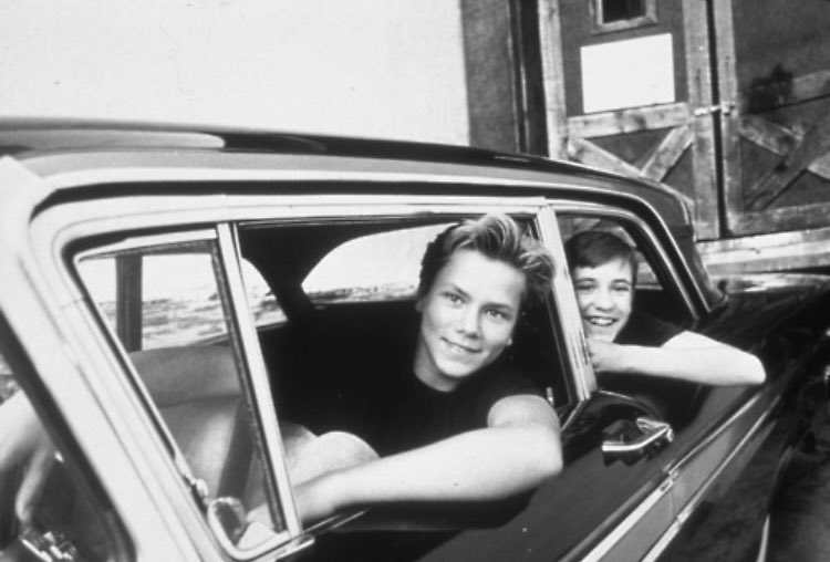 vogue80s's tweet photo. River Phoenix and Wil Wheaton https://t.co/5BObKJO3kD