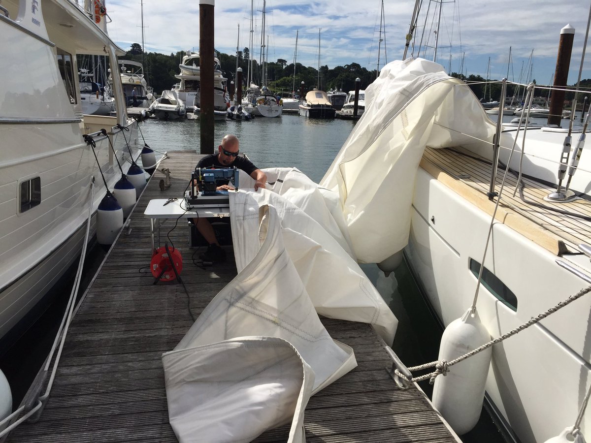 ATSails's tweet image. The new portable sewing machine earning it's keep @Sailrite @Solentsew