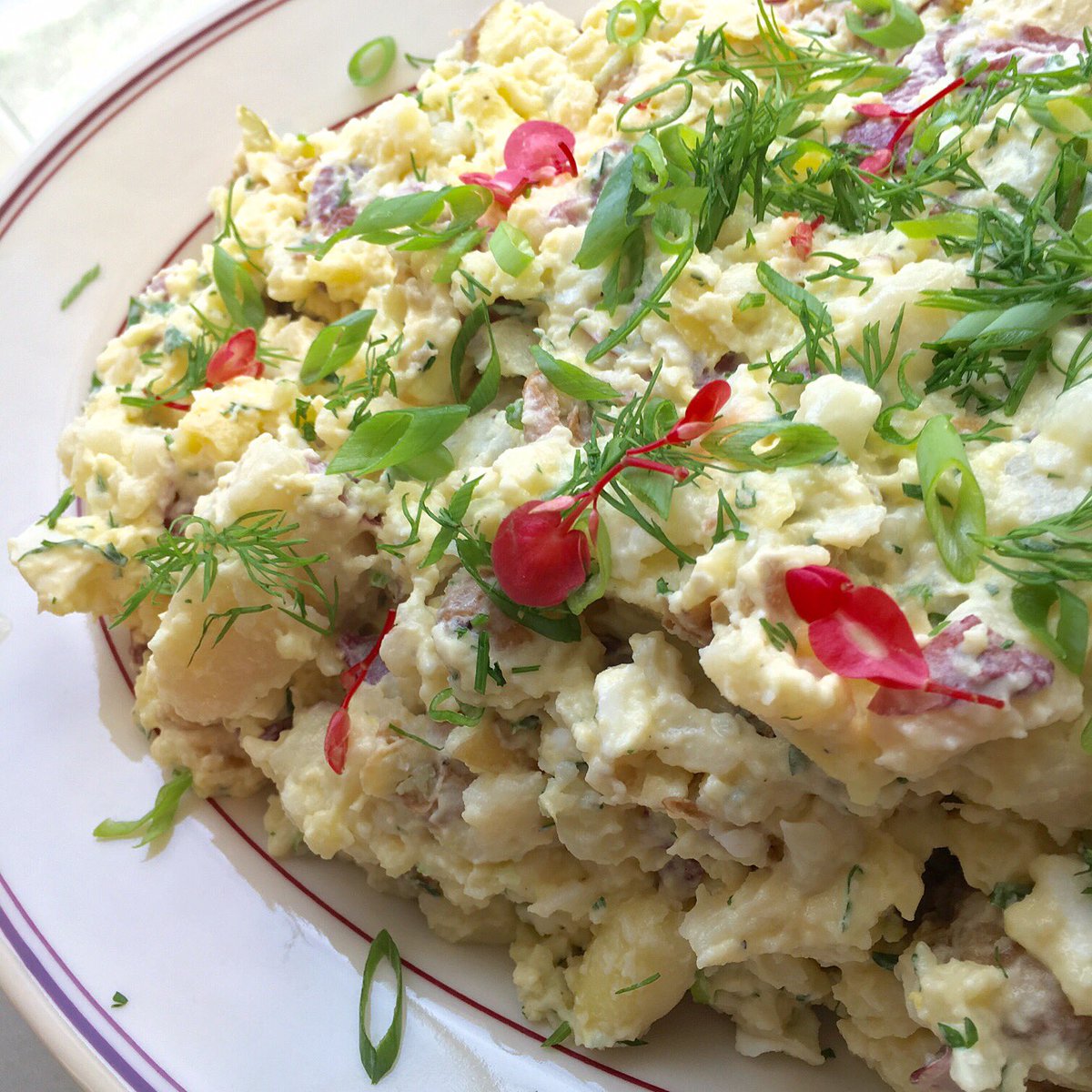 Grandma Louise's potato salad, made with Chef Amy's grandmother's recipe: young red potatoes, fresh herbs and love.