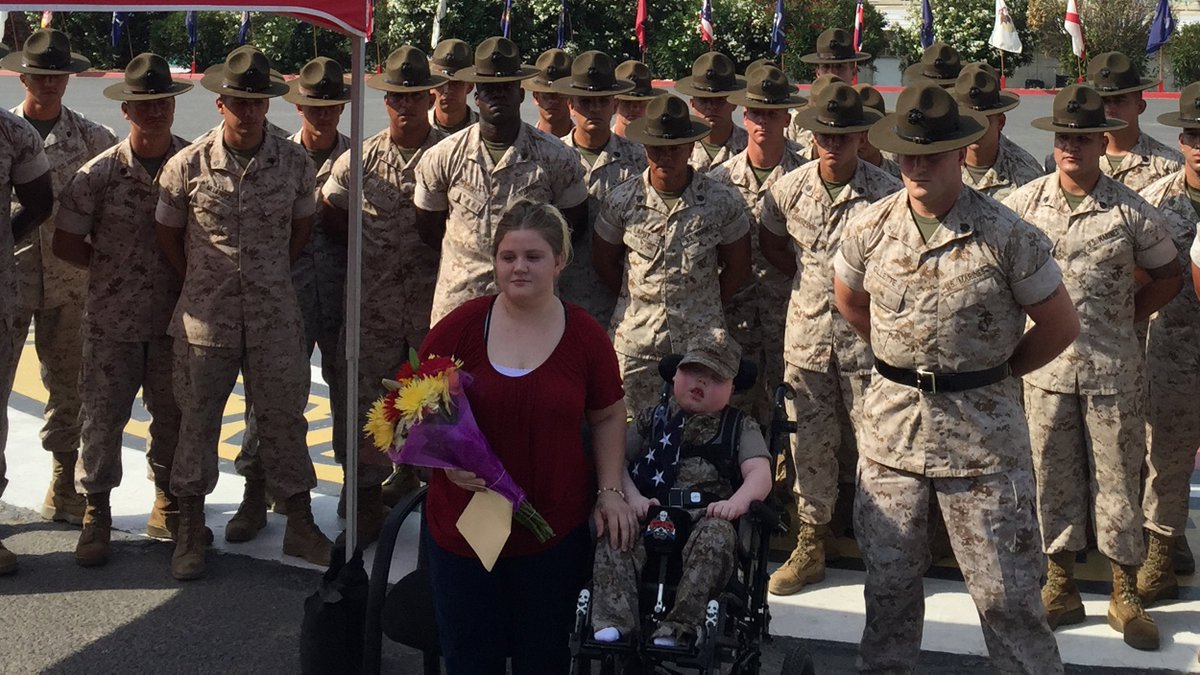 TODAYshow's tweet photo. 8-year-old with terminal illness becomes honorary US Marine — see the photos https://t.co/PB2PGuS98j https://t.co/TJ0shxjlW1