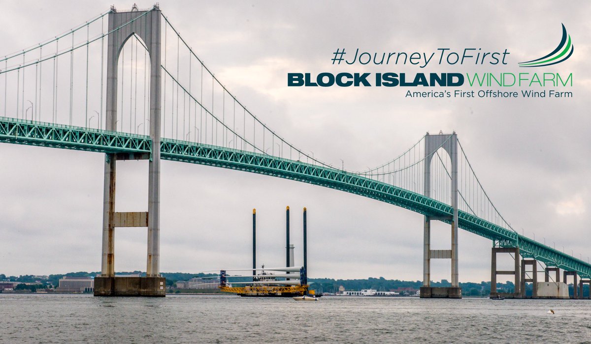 OrstedUS's tweet photo. Vessel w/ tower section and blades passing under Newport Bridge. Next stop #BlockIslandWindFarm! #JourneyToFirst https://t.co/91avJhnKrf