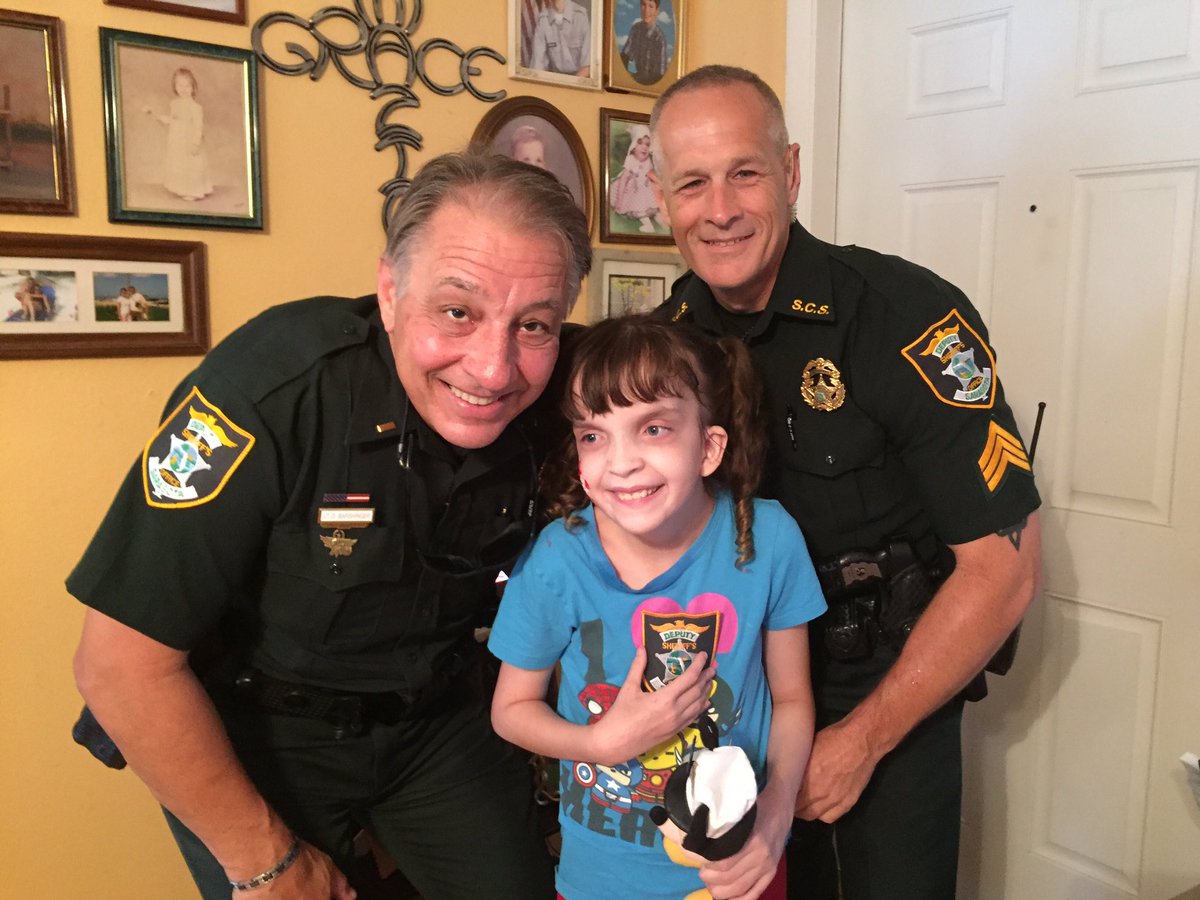 SarasotaSheriff's tweet photo. Lt. Barshinger & Sgt. Legg surprise Grace Weigman at her 9th birthday party. #SCSOService #LESM #Service #Community https://t.co/PIACMDwwI3