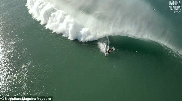 Pretty cool footage Drone captures surfer casually gliding through a monster barrel wave dailym.ai/2aHjFmO