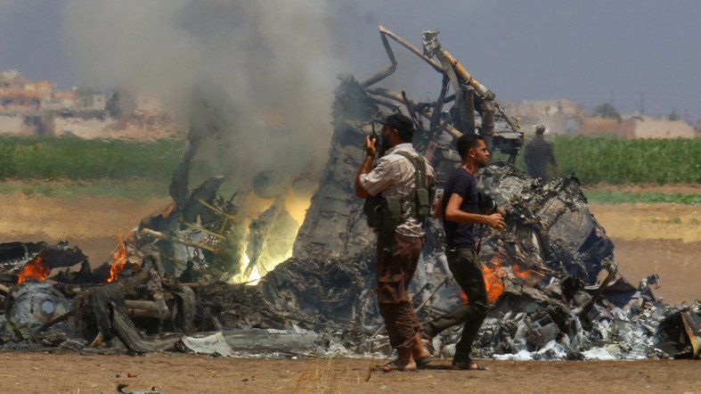 arabnews's tweet photo. PAYBACK TIME
People inspect the wreckage of a Russian helicopter downed in Idlib, Syria, by freedom fighters. https://t.co/5W2rStaeXY