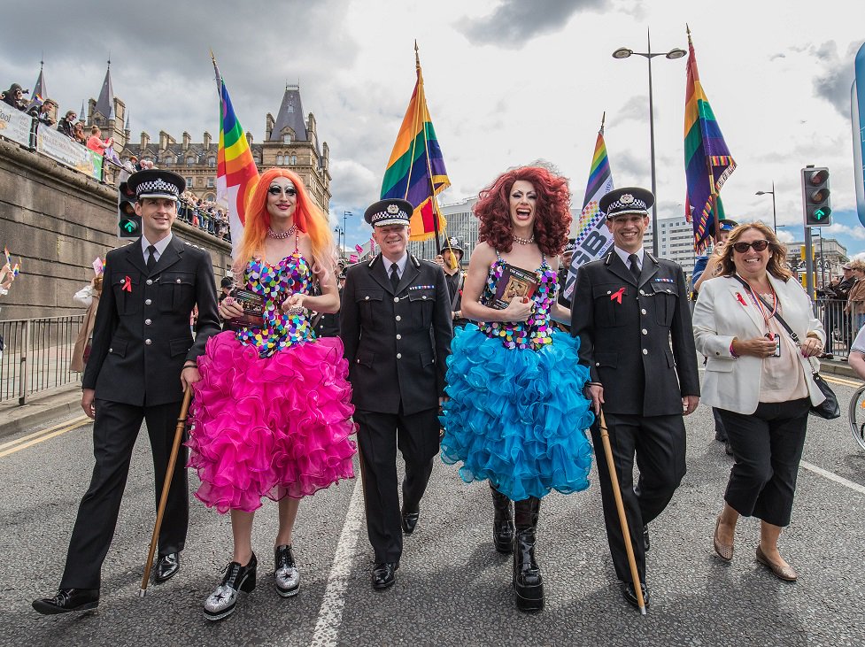 MerseyPolice's tweet photo. Police with Pride - Chief Insp Paul Court, Chief Constable Andy Cooke and ACC Ian Critchley at #LiverpoolPride2016 https://t.co/8rTvRSny9U