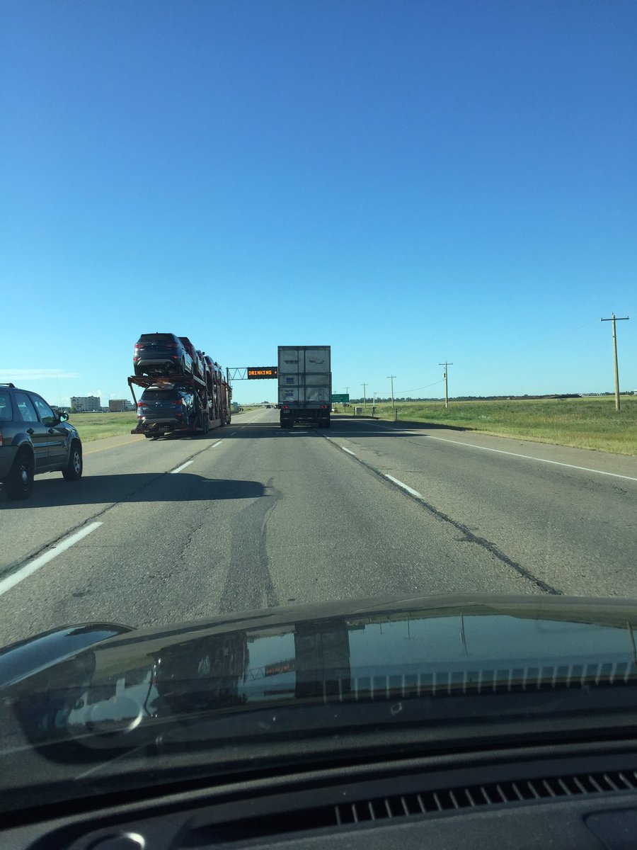 MitchellMedia4's tweet photo. Alberta Blue Sky backdrop to 2 (was 3) semi trucks taking up all 3 lanes when 1 finally got behind the other #QE2SB https://t.co/4Cm1ZQS33x