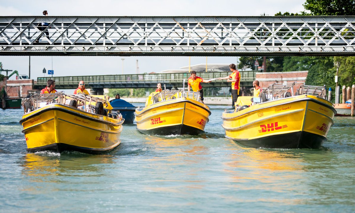 DeutschePostDHL's tweet photo. No cars, no vans, just a fleet of boats - and hordes of tourists. That's #logistics in #Venice! https://t.co/w5n6GvasUq