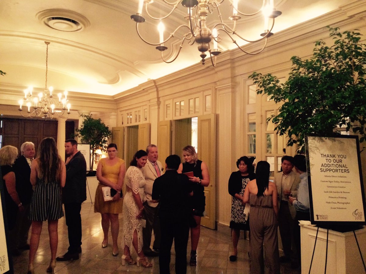 Enjoying cocktail hour before being seated for the annual Give Me Five dinner