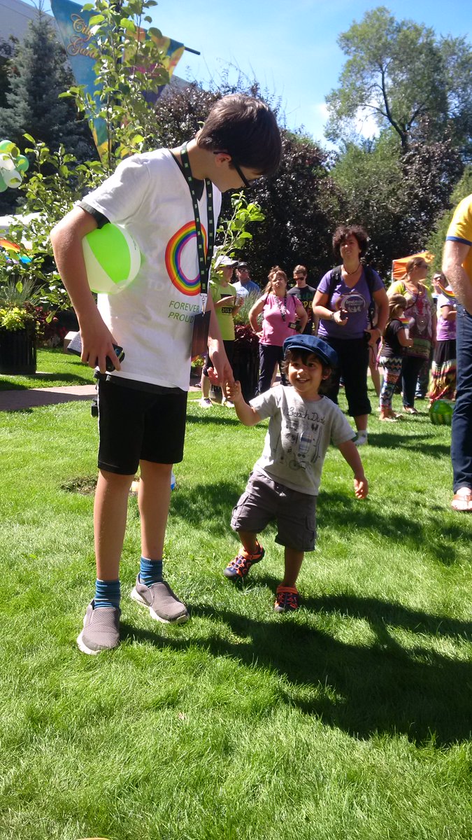 My boy dancing up a storm with his new best friend at Red Deer Pride today - great day had by all!