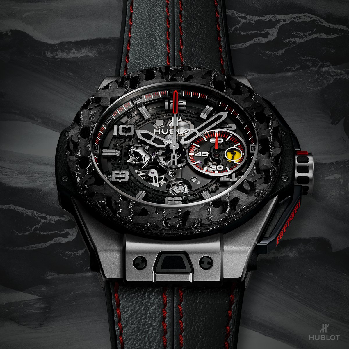 Hublot's tweet photo. The best of both worlds: this #BigBangFerrari features a proprietary carbon fiber encrusted with titanium. https://t.co/W7x8yMqeBU