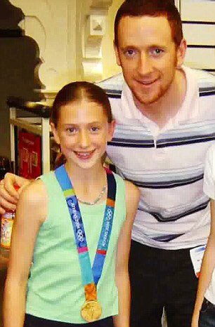 DawnHFoster's tweet image. Love tiny Laura Trott wearing Bradley Wiggins' 2004 medal #Rio2016
