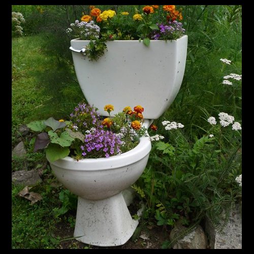 arizonapottery's tweet photo. Ok - not sure! Share with us how you feel about this re-purposed garden planter! #oddpots #toiletplanter #garden https://t.co/C3dqI6oysY