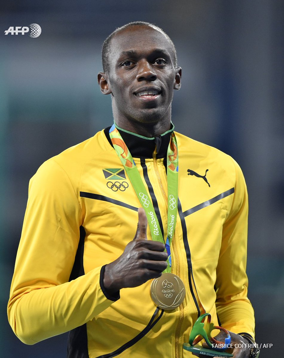 rio2016 usain bolt (gold medal) poses during the podium ceremony for