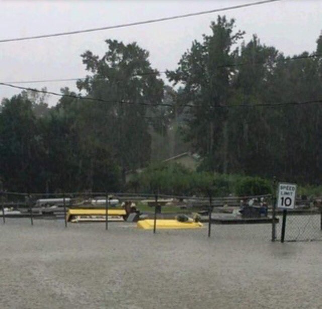 soulljahhh's tweet image. Caskets floating around baton rouge due to flooding, creepy.