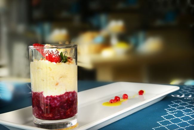 _ElManza's tweet photo. Roz Bi Halib is Rice pudding flavored with cinnamon, orange blossom, topped with almonds and raisins.m https://t.co/MbDg1Evp2o