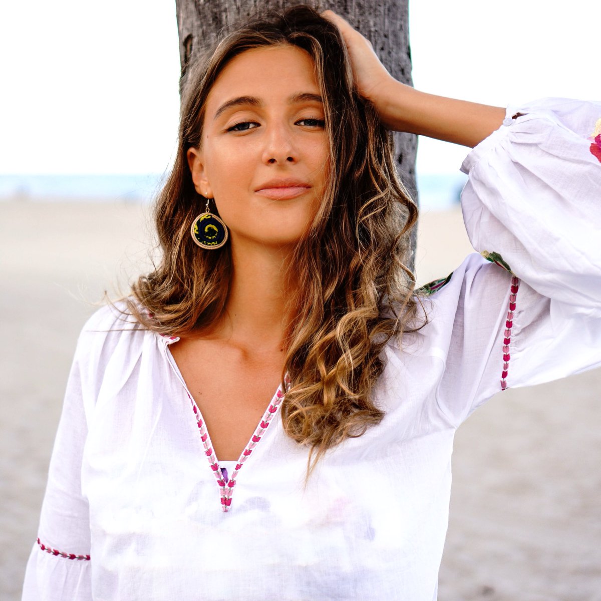 tanyalitkovska's tweet image. Wearing @SongaDesigns earrings and @pilyqswimwear tunic. 🌴 Check the new story!🌞 hidemycoat.com