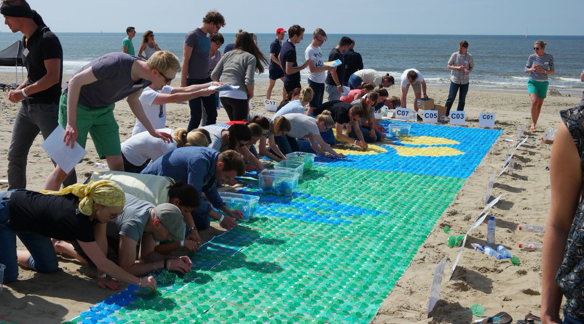 RWE_Consulting's tweet photo. Creating the world’s largest drink umbrella mosaic was a tedious process. Watch the video: https://t.co/l9uKHnajsk https://t.co/VdTPSS6jrH