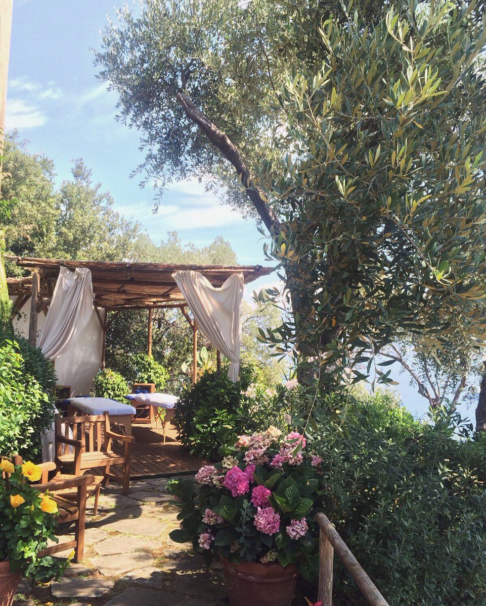 hotelsplendido's tweet photo. Would you rather have a relaxing massage or invigorating yoga lesson with a view in this corner of #Portofino? https://t.co/VowNVa8rKE