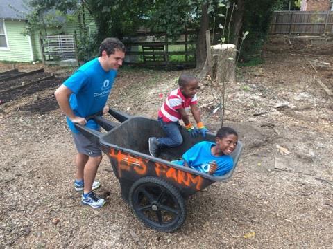 FoodShuttle's tweet photo. #TBT to IFFS board member @NationHahn planting joy at Camden Street Learning Garden #foodshuttlegrows https://t.co/EgGF2zz7W9