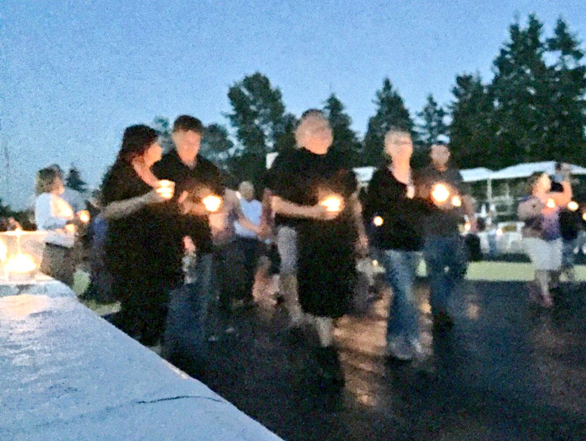 NHRA's tweet image. The racing community took part in a candlelight track walk for Starter Mark Lyle tonight in Seattle. #RIPMarkLyle
