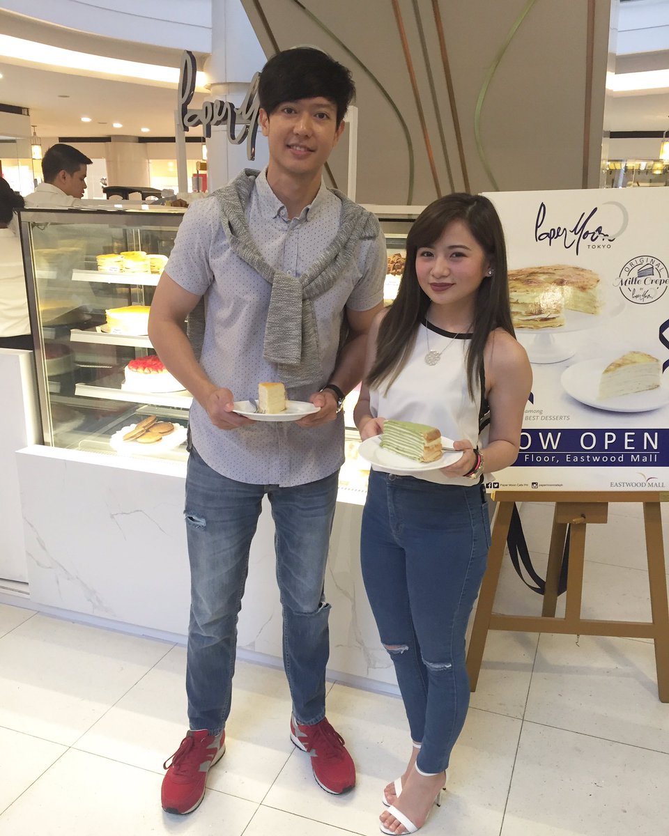 ronnieliang's tweet photo. opening of #papermooncafePh #eastwoodmall   
@vivaartistsagency #ronnieliang &amp; #ellacruz @foldedandhungph https://t.co/GUcHeTT0hk
