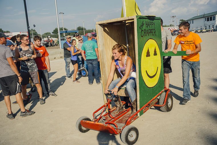 sentineltribune's tweet photo. Racers flush with excitement over @woodcountyfair's 1st ever Outhouse Races. https://t.co/FdC6OcFTPI https://t.co/wq1sopLXLz
