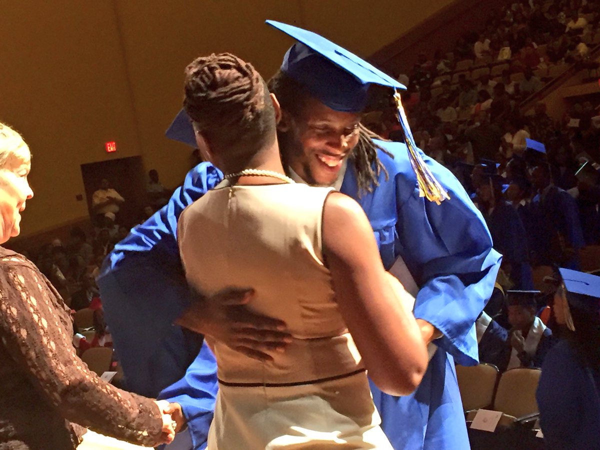 dcpublicschools's tweet photo. This @BallouSTAYDC grad is all smiles after receiving his diploma. #DCPSGrad https://t.co/BH2mPn58Ko