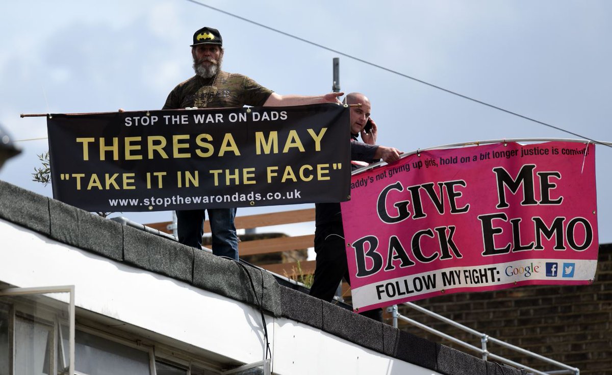theipaper's tweet image. There are protesters from Fathers 4 Justice on Jeremy Corbyn's roof