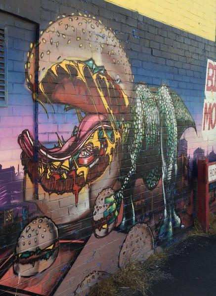 PokemonGoNews's tweet image. A burger bar updated their artistic mural since they are a PokéStop in #PokemonGO. [credit] u/Pixlriffs