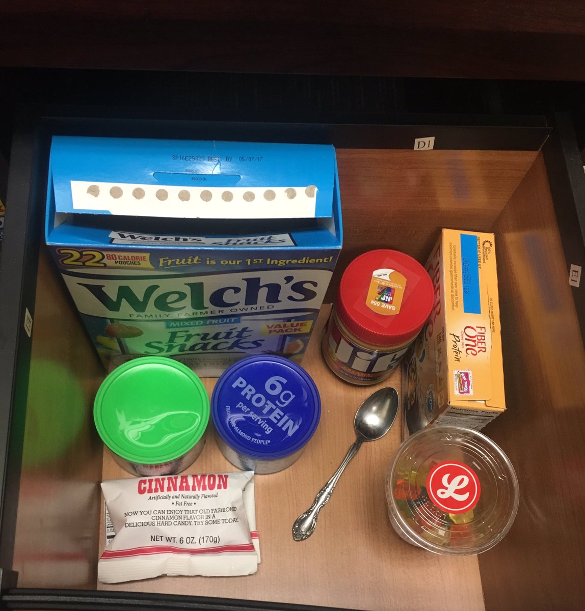 Girl_on_fire507's tweet photo. My snack stash at work #needfood #almonds #fiberbars #PBoutthejar #gummybears #hardcandy #fruitsnacks https://t.co/2A75V5Z8Of