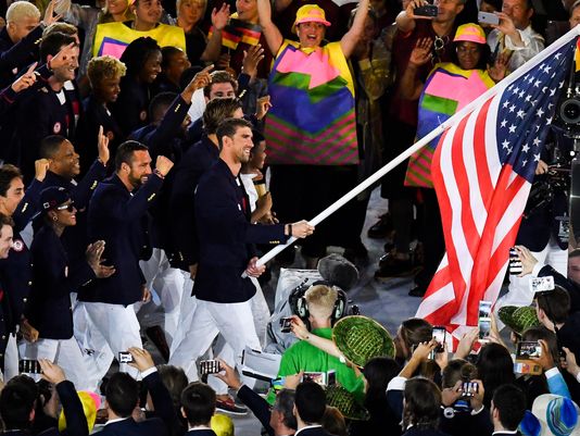 USATODAY's tweet image. Michael Phelps has left the building #Rio2016 #OpeningCeremony usat.ly/2b0oG9D (Photo: Kyle Terada)