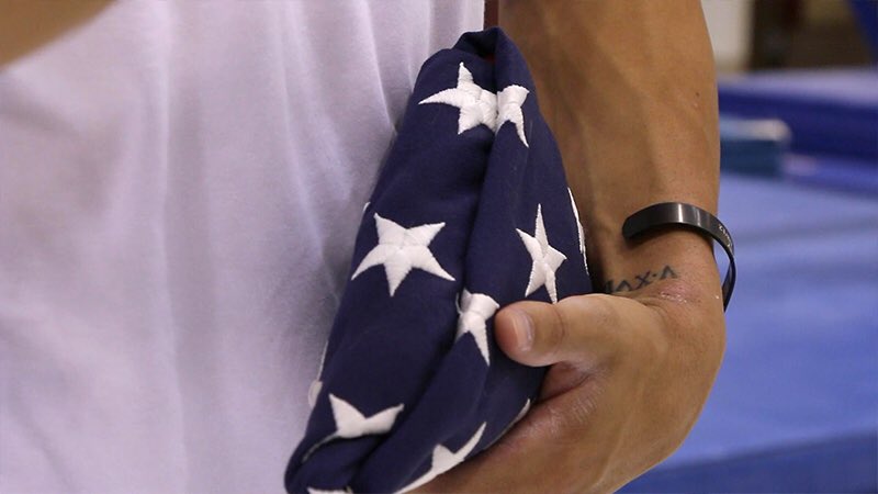 OU_Athletics's tweet photo. Jake Dalton carrying a very special flag with him for #Rio2016

https://t.co/n30PnYAAYX

#TeamUSA  #SoonersInRio https://t.co/xaGjOnLCgV