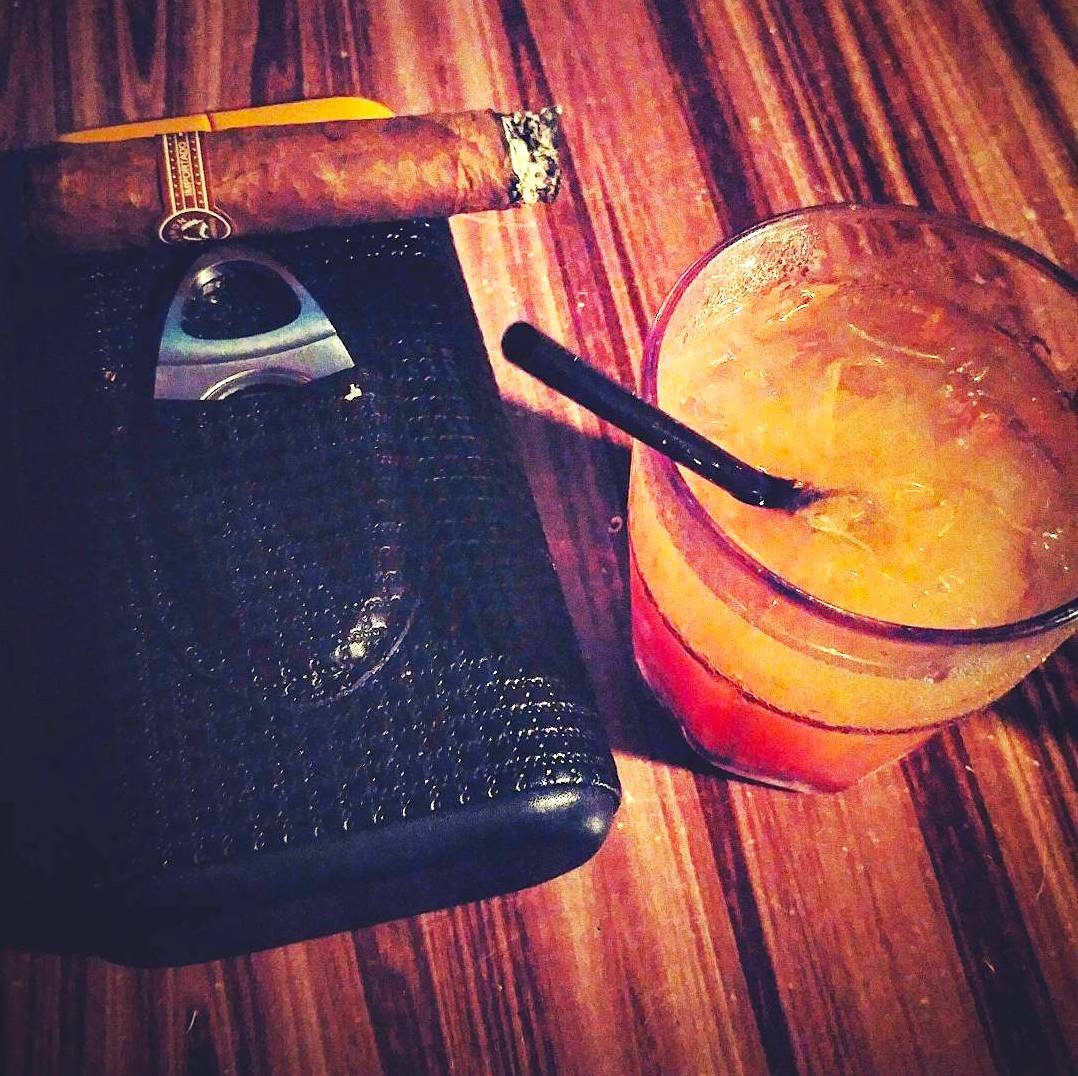 Your Weekend Survival Kit. #weekend #cocktails #cigar #smokingpatio #relax