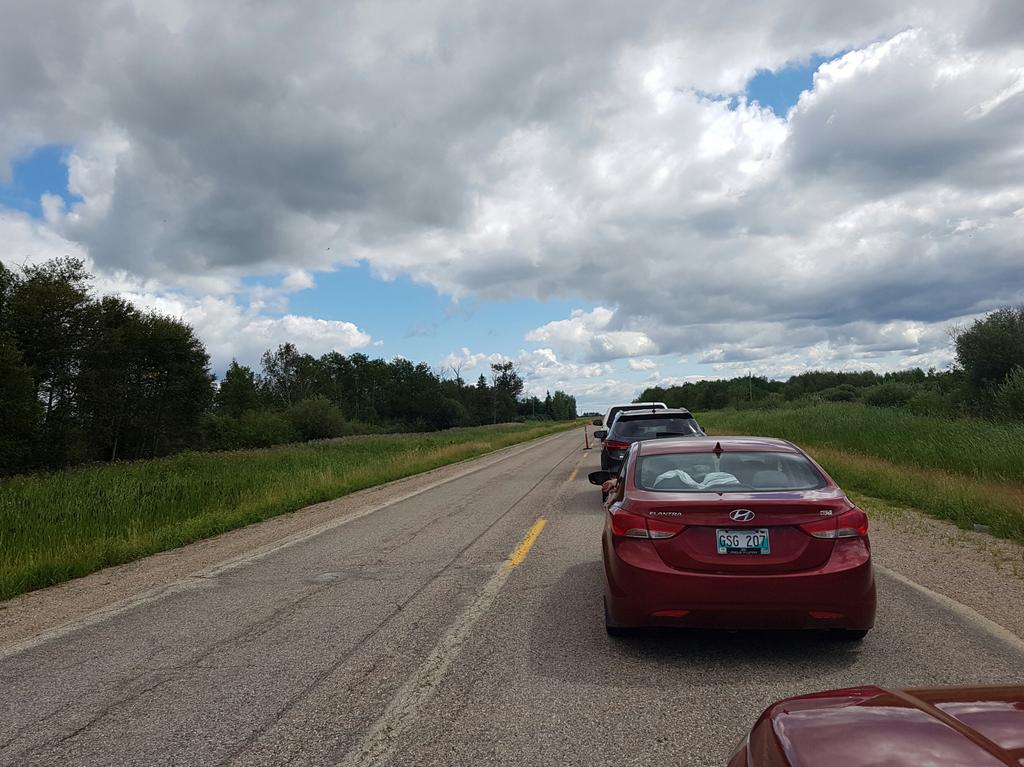 shannbil's tweet image. Almost to the lake...then this happens...cloudy skies and construction! :( #needvitamind #Manitoba #avoidhwy317