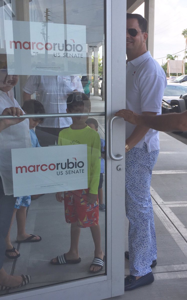 MarcACaputo's tweet photo. Campaign fashion report: Rubio's bestie @BernieNavarro7 rocking grouper-print pants at Mia field office opening https://t.co/2Y9KfGEOIi