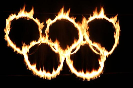 What do the olympic rings and flame represent?- iWONDER