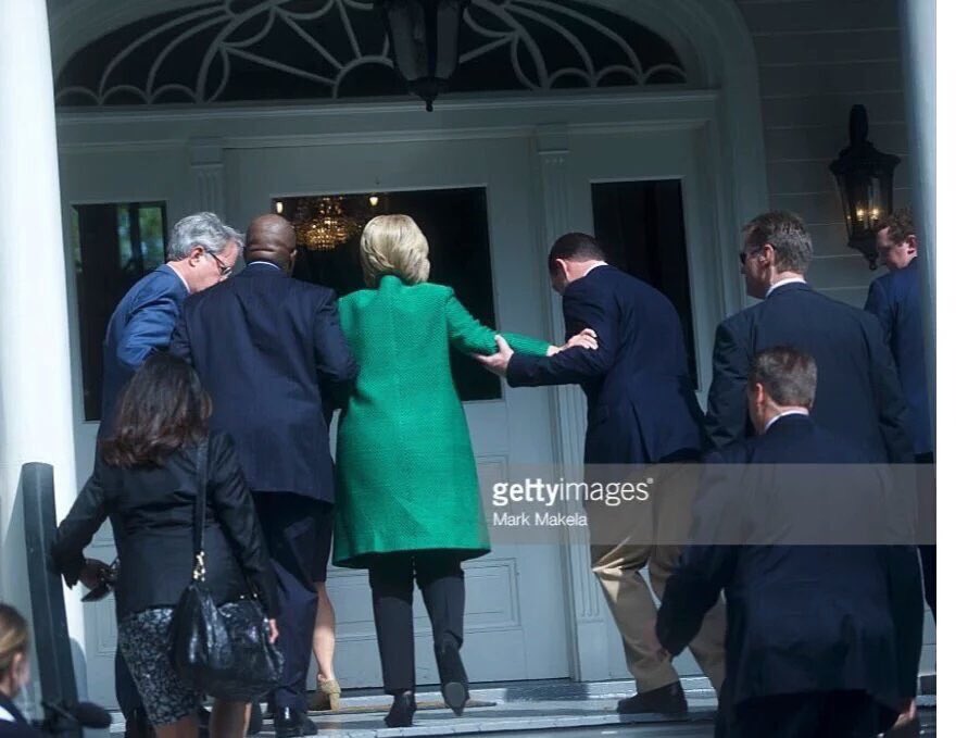 Unwell Hillary Clinton needs help up stairs (PHOTO)