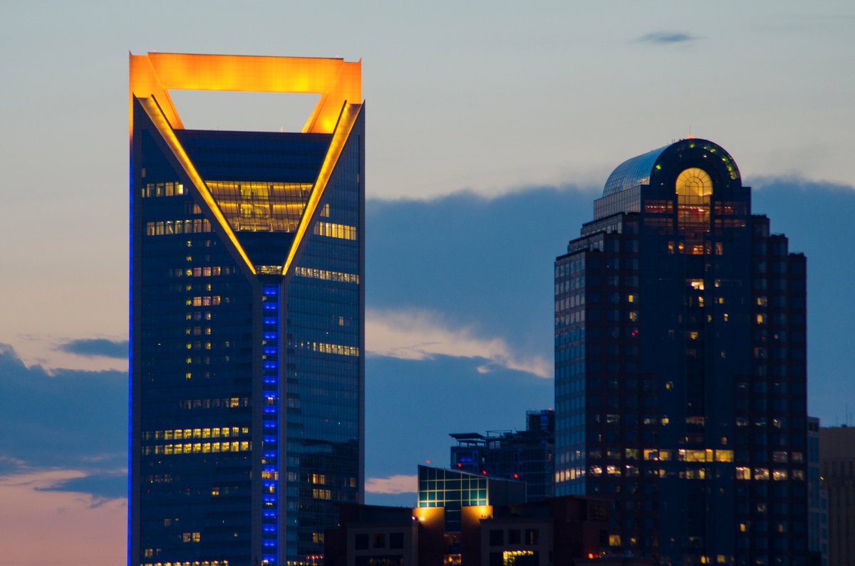 AbilityEXP's tweet photo. Tonight Wells Fargo’s Duke Energy Center is lit in blue &amp; gold to welcome the #JOHsouth team to Charlotte, NC! https://t.co/ysORTgJ8jU