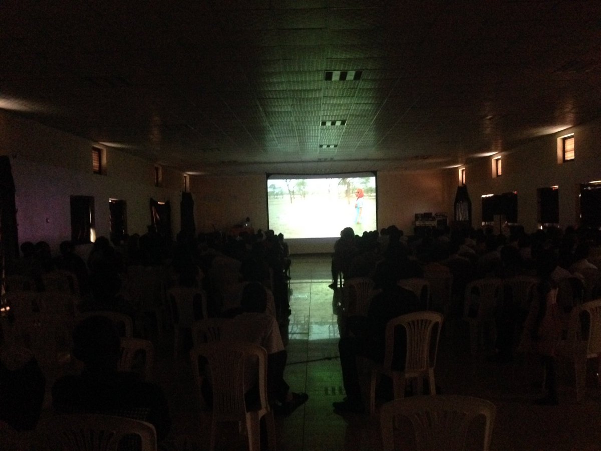 MaishaFilmLabs's tweet photo. Day 2: Screening BEATS OF ANTANOV by Sudanese director Hajooj Kuka ( @hajooj ) at #MAFF2016 in Gulu, Uganda. https://t.co/rM9GFMUQDr
