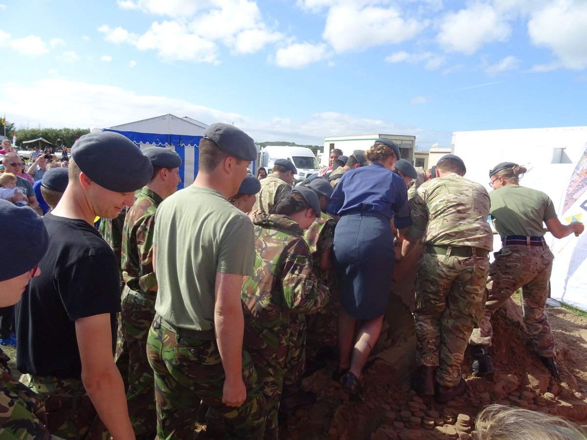 SouthGlosShow's tweet photo. The sand sculpture bit the dust at the hands (and feet) of the Bristol Air Cadets! @MeningitisNow #SGS16 https://t.co/2EyATdlPpp