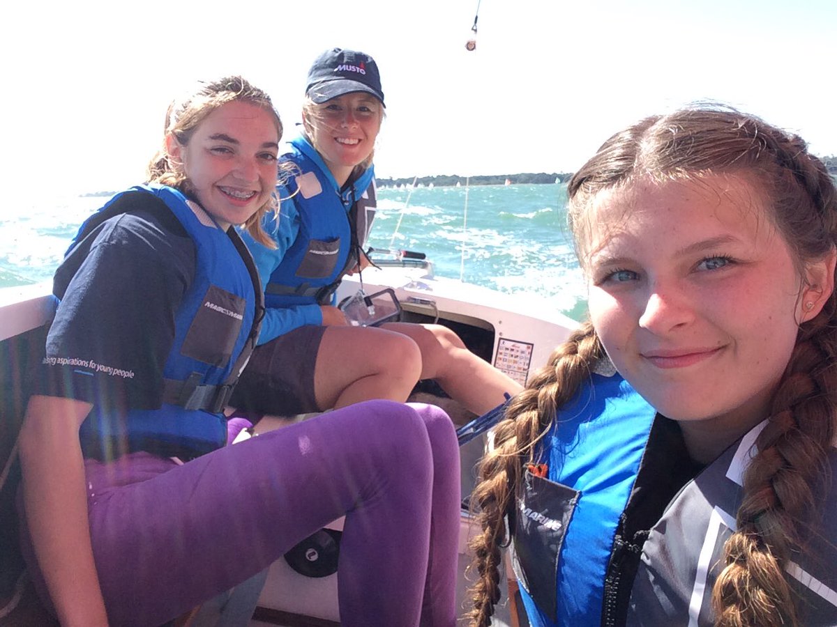PortsmouthSTT's tweet photo. So much fun so far! Thank you @MUSTOclothing for our hats! #Under25 #CowesWeek #GirlsAfloat @PortsmouthColl https://t.co/9EHeZxZBPx