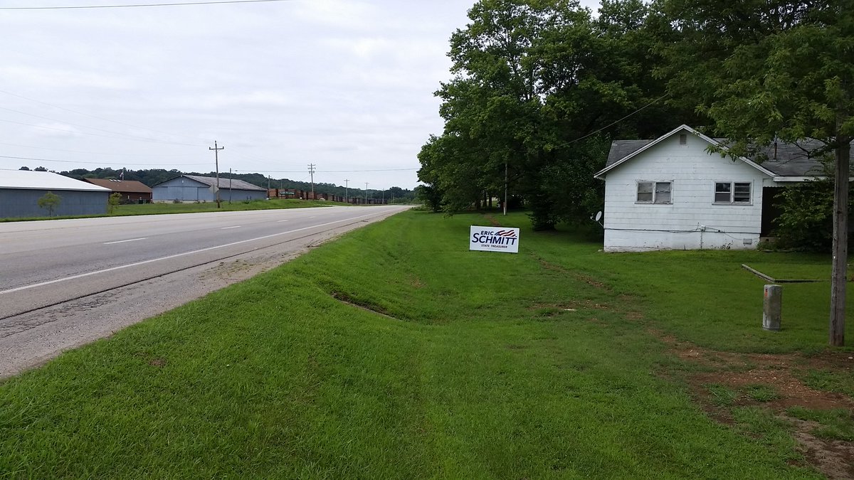 Hanging up <a href="/Eric_Schmitt/">Eric Schmitt</a> signs on this beautiful Sunday.