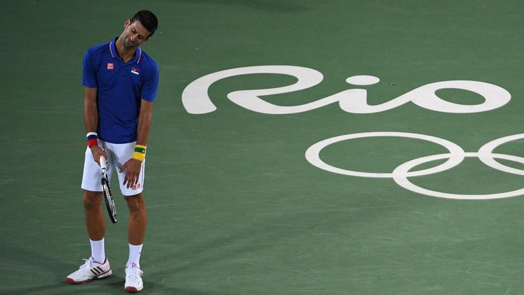 ChicagoSports's tweet photo. Top-ranked Novak Djokovic swept out of Olympics in first round by Juan Martin del Potro https://t.co/J0plwI19JY https://t.co/MhQCWrC3bN