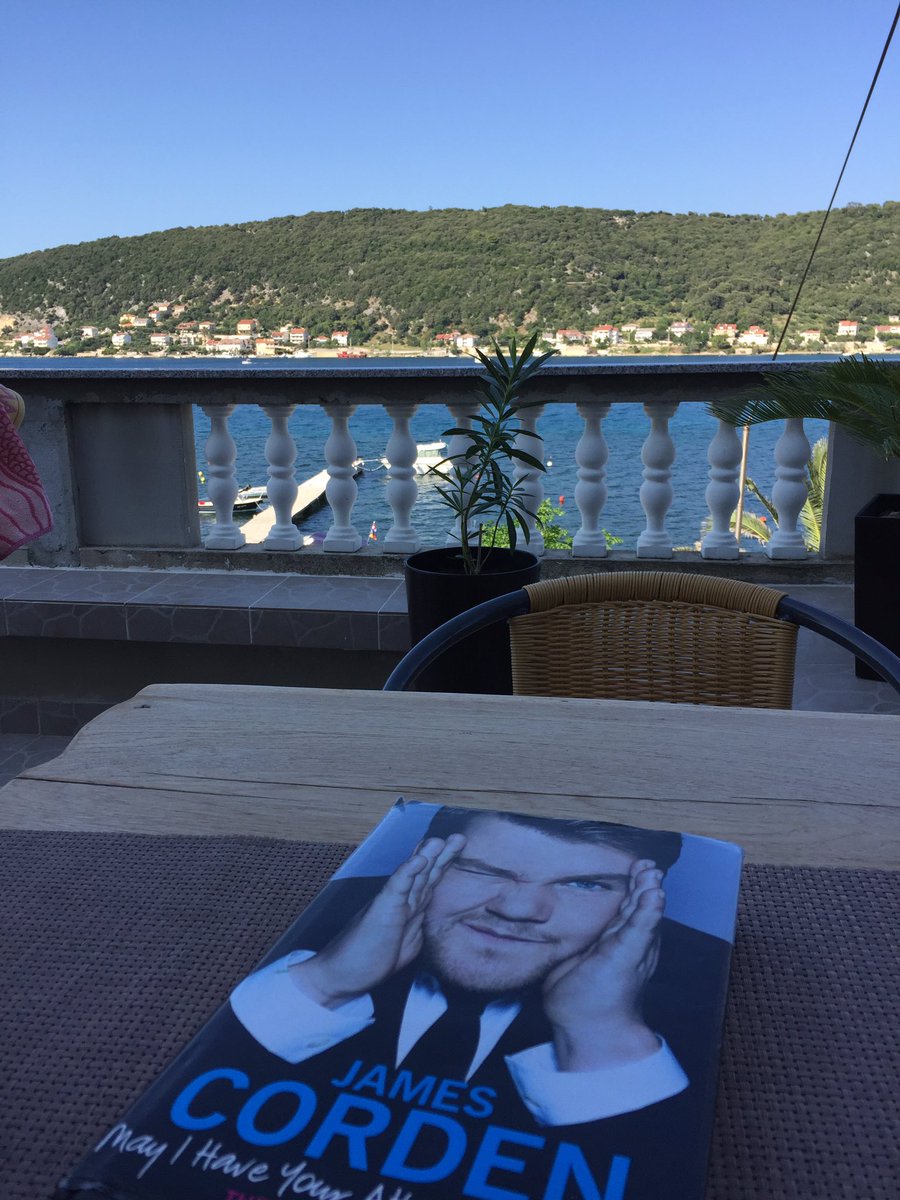 Amazing view and a cracking read so far <a href="/JKCorden/">James Corden</a> #holidayreadingofchoice