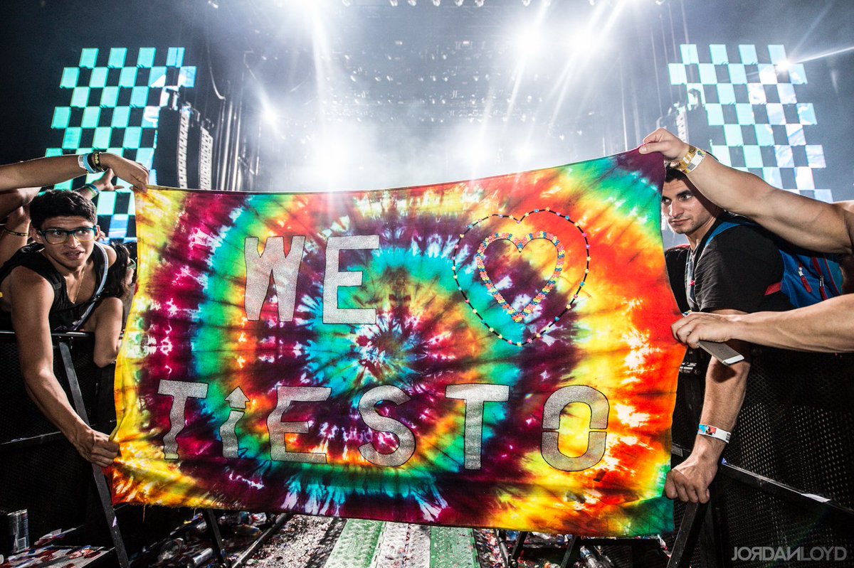 tiesto's tweet image. I always love seeing these creative signs out in the crowd 🙌