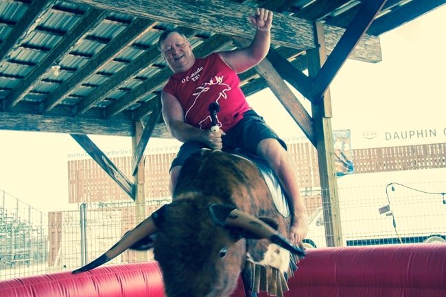 dauphincfest's tweet photo. This guy did his best on the mechanical bull during @Country_Fest 2016! #cfest2016 #dauphinscountryfest https://t.co/YczEXQLU4l