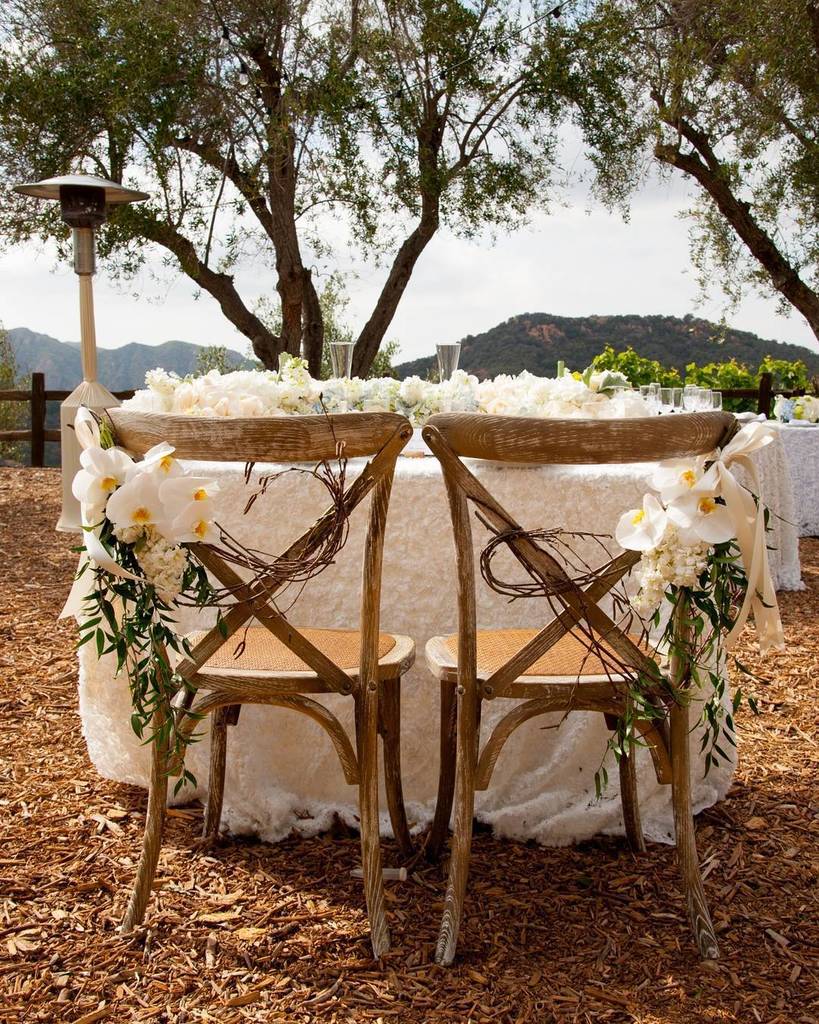 we are in love with the delicate floral &amp; vine details on our Country Side Chair at this outdoor ceremony (Florals …
