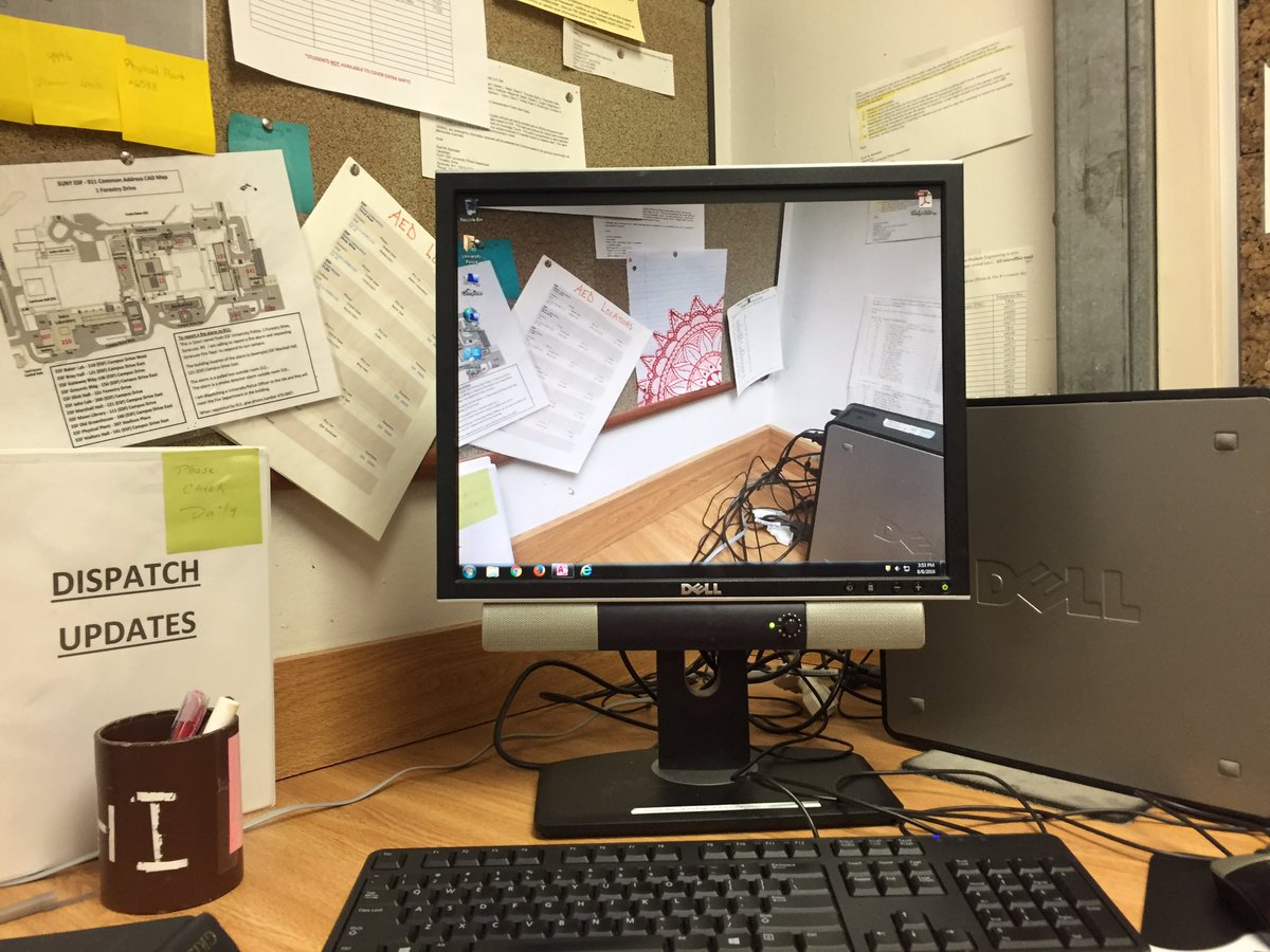 MichaelaKarcher's tweet photo. The other dispatcher at upd gets very bored and sets the background to literally what's behind the screen... https://t.co/i3wT2ArsJf