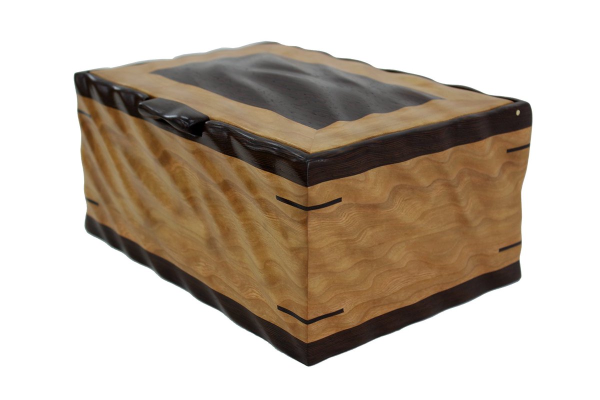 NickJonesDesign's tweet image. Hand sculpted valet and watch box made of solid Wenge and Cherry wood.  Straight grained to curvy with a light touch