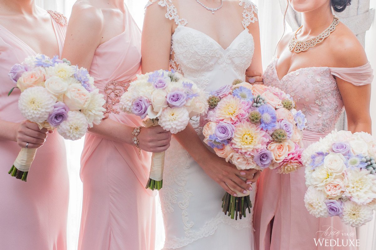 wedluxe's tweet photo. This #bride and her pastel-clad #bridesmaids have us tickled pink- each gown showcases their individuality! https://t.co/54A8E6aTH3
